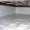 A crawl space vapor barrier has been installed on the walls and floors of this space in North Charleston.