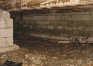 Rotting, decaying crawl space wood damaged over time in Denmark