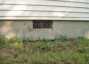 Open crawl space vents that let rodents, termites, and other pests in a home in Orangeburg