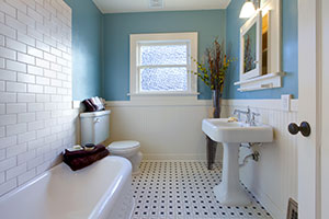Old meets new - subway tile, black & white flooring, and modern fixtures create a unique look.