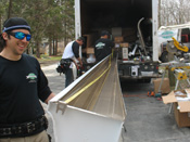 Forming aluminum gutters before installation in Charleston